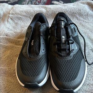 Nike Black Athletic Shoes with Breathable Mesh Design